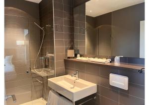 Koupelna v ubytování Grand Hotel de Castres