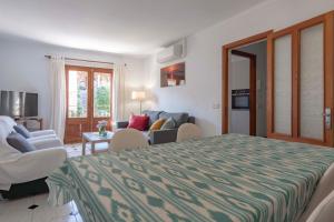 Postel nebo postele na pokoji v ubytování Casa Lleó by Feseal + 6 fotografií