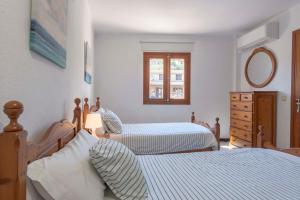 Postel nebo postele na pokoji v ubytování Casa Lleó by Feseal