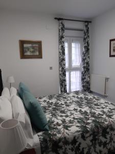 Postel nebo postele na pokoji v ubytování Hotel Los Caspios