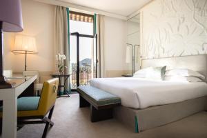 Hotel Royal-Riviera客房内的一张或多张床位