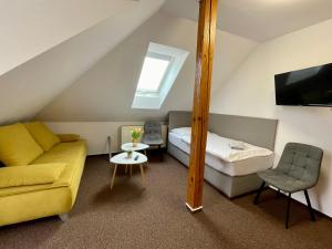 TV a/nebo společenská místnost v ubytování Hotel Aldo