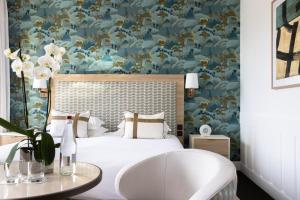 Hotel Royal-Riviera客房内的一张或多张床位