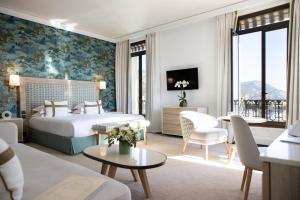 Hotel Royal-Riviera客房内的一张或多张床位