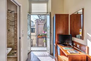 TV a/nebo společenská místnost v ubytování Hotel Katty