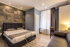 Katil atau katil-katil dalam bilik di Residenza Belli Inn