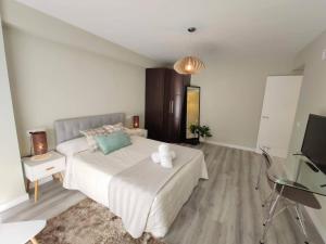 Posteľ alebo postele v izbe v ubytovaní Apartamento Mármoles - Centro Málaga + 2 fotografie