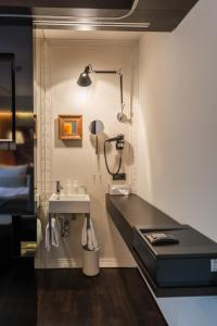 Una cama o camas en una habitación de Nala Individuellhotel