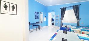 Кровать или кровати в номере Ciwidey Homestay