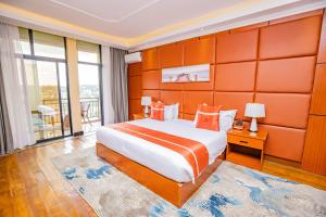 Krevet ili kreveti u jedinici u okviru objekta M Hotel Kigali