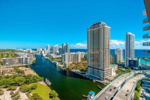 an aerial view of a city with a river and buildings at Lovely Studio with Amazing Views in Hallandale Beach