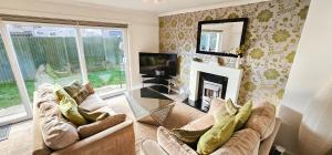Χώρος καθιστικού στο Dochart 3 Bedroom Apartment - Edinburgh