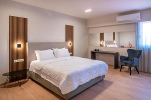 Postelja oz. postelje v sobi nastanitve KOSMAPOLITAN hotel