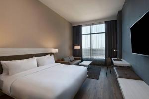Postel nebo postele na pokoji v ubytování AC Hotel by Marriott Fort Worth Downtown + 37 fotografií