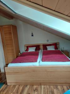 Postel nebo postele na pokoji v ubytování Haus Kerstan