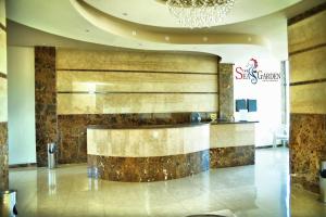 a lobby with a reception desk in a building at La mer Hotel in Alexandria +40 photos