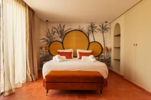 Ένα ή περισσότερα κρεβάτια σε δωμάτιο στο JW Marrakech Domaine d'Exception +150 φωτογραφίες