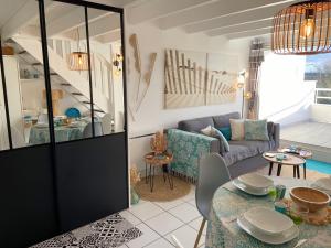 Khu vực ghế ngồi tại TADORNES 2 - Appartement duplex Carnac, Piscine - T130