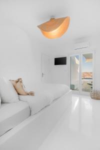 Postel nebo postele na pokoji v ubytování Island Riviera Mykonos Villa + 36 fotografií