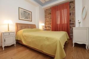 Katil atau katil-katil dalam bilik di Avgerinos Hotel