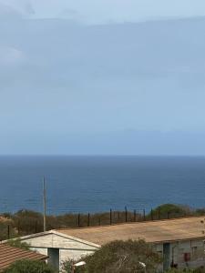 a view of the ocean from a house at HÉBERGEMENT Sahnoun in Mostaganem +7 photos