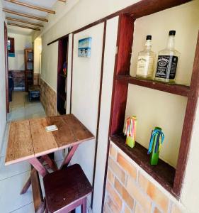 Η κουζίνα ή μικρή κουζίνα στο Kitnet, Condominio VilaZion, Arraial D'Ajuda centro +4 φωτογραφίες