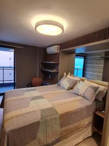 Ένα ή περισσότερα κρεβάτια σε δωμάτιο στο Exclusiva Cobertura no Gold B -Landscape +30 φωτογραφίες