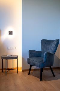Predel za sedenje v nastanitvi KOSMAPOLITAN hotel
