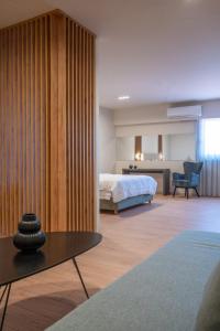 Postelja oz. postelje v sobi nastanitve KOSMAPOLITAN hotel