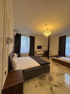 Postel nebo postele na pokoji v ubytování Mirvarim Hotel + 21 fotografií