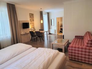 TV a/nebo společenská místnost v ubytování Hotel Rössle