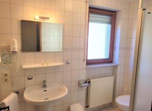 Koupelna v ubytování Hotel Rössle