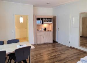 Kuchyň nebo kuchyňský kout v ubytování Hotel Rössle
