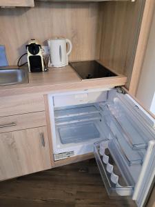 Kuchyň nebo kuchyňský kout v ubytování Hotel Rössle