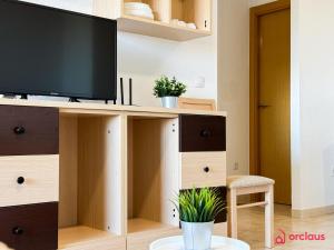 TV a/nebo společenská místnost v ubytování Mar Infinito
