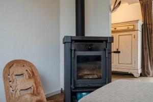 Ένα ή περισσότερα κρεβάτια σε δωμάτιο στο Hello Zeeland - Vakantiewoning Burgvliet 66