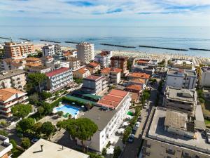 an aerial view of a city with the ocean at Hotel Vannini in Rimini