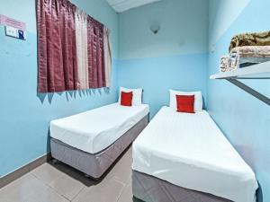 Postel nebo postele na pokoji v ubytování LH Resak Hotel