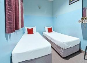 Postel nebo postele na pokoji v ubytování LH Resak Hotel