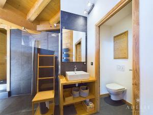 a bathroom with a sink and a toilet at Luxueux Appartement 4* Alpin, 5 Pièces, 4 Ch, Proche Pistes, Parking, WiFi - FR-1-398-549 in La Rosière +17 photos
