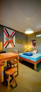 Ένα ή περισσότερα κρεβάτια σε δωμάτιο στο Rancho Acácia São Roque