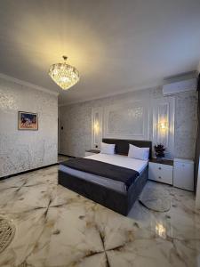 Postel nebo postele na pokoji v ubytování Mirvarim Hotel