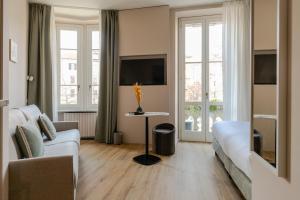 TV a/nebo společenská místnost v ubytování Aiello Hotels - Isola Design District