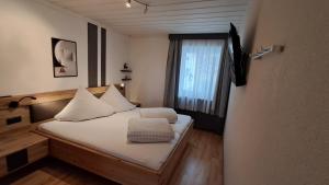 Postel nebo postele na pokoji v ubytování Apart Austria + 37 fotografií