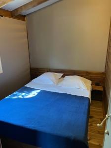 Postel nebo postele na pokoji v ubytování Camping de la Dune "Les Flots Bleus"