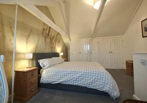 Ένα ή περισσότερα κρεβάτια σε δωμάτιο στο Calleron