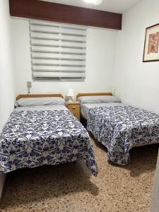 Ένα ή περισσότερα κρεβάτια σε δωμάτιο στο Los Olivos BB1