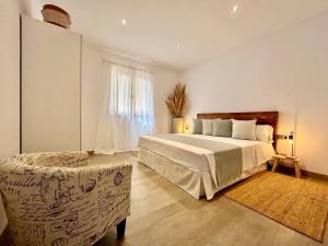 Postel nebo postele na pokoji v ubytování Ca'n Mutxo, vistas increíbles, piscina y barbacoa + 47 fotografií