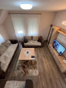 Posezení v ubytování Apartman KVINS