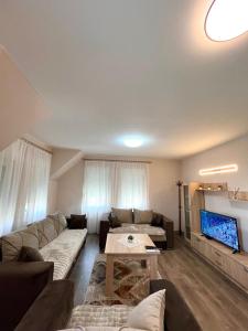 Posezení v ubytování Apartman KVINS
